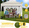 A family is enjoying a meal under a beige pop-up gazebo in a grassy garden. Náhľad obrázku produktu