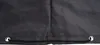 A close-up view of the bottom edge of a black protective cover, showing grommets and a drawstring. Produktbild-Vorschau