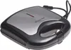 A close-up shot of a black and silver sandwich maker. Anteprima dell’immagine prodotto