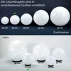 The image shows two rows of white spherical lights, with measurements indicating their sizes. The top row displays lights with diameters from 20cm to 50cm, and the bottom row shows lights with heights from 22cm to 52cm. Podgląd zdjęcia produktu