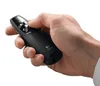 A hand holding a black Logitech wireless presenter. Podgląd zdjęcia produktu