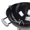 Close-up view of the inside of a black kettle grill. Produktbild-Vorschau