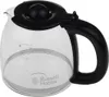 A clear glass coffee pot with a black handle and lid, resting on a white background. Measurement markings are visible on the side of the pot. Anteprima dell’immagine prodotto