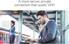 A man in a suit is working on a laptop at a train station, with other people in the background. Anteprima dell’immagine prodotto