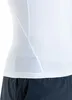 A close-up view of the side of a white t-shirt with dark shorts underneath. Produktbild-Vorschau