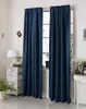 A room interior with dark blue curtains covering a window. Produktbild-Vorschau