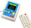 A multi-function tester and a remote control are shown on a white background. Podgląd zdjęcia produktu