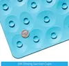 Close-up of a blue bath mat with suction cups, with a quarter coin for scale. Produktbild-Vorschau