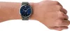 A close-up shot of a person's wrist wearing a blue Emporio Armani watch. Voir les images du produit