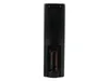 The back of a black remote control with two AA batteries inserted. Produktbild-Vorschau