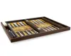 A backgammon board is shown from a diagonal angle. Produktbild-Vorschau