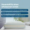 A pillow is shown in a bedroom setting with text overlay describing its benefits. Produktbild-Vorschau