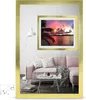 A living room scene with a pink sofa, a coffee table, and a framed picture on the wall. Produktbild-Vorschau