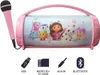 A pink portable speaker with a microphone and graphics of characters from Gabbys Dollhouse. Below the speaker are icons representing USB, Micro SD/TF Card, Aux-In, and Bluetooth connectivity. Voir les images du produit