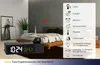 A bedroom scene with a digital alarm clock and a feature list overlay. Anteprima dell’immagine prodotto