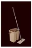 A mop and bucket set against a dark brown background. Náhled obrázku produktu