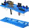 A blue plastic tool organizer rack filled with various tools, including drills, screwdrivers, and bits. Below it is a second, empty blue plastic organizer rack. Náhled obrázku produktu