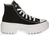 A studio shot of a black high-top sneaker with a thick white platform sole. Náhľad obrázku produktu