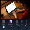 A person is using a tablet with a keyboard and mouse on a wooden desk. Produktbild-Vorschau