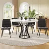A dining set with a round marble-top table and four dark gray chairs, set in a well-lit room with arched windows and a wooden cabinet. Náhled obrázku produktu