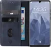 A blue flip cover phone case with card slots and a euro banknote is shown next to a smartphone displaying the time and date. Produktbild-Vorschau