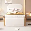 A child's bed with a cloud-shaped headboard and a pull-out trundle bed, set in a bedroom. Náhled obrázku produktu