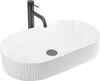 A white oval countertop sink with a black faucet against a white background. Anteprima dell’immagine prodotto