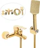 A gold-colored shower set including a faucet, shower head, hose, and mounting hardware, displayed against a white background. Podgląd zdjęcia produktu
