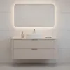 A modern bathroom vanity with a sink and mirror, set against a tiled wall. Anteprima dell’immagine prodotto