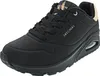 A single black Skechers sneaker with gold accents is shown from a three-quarter side view against a white background. Anteprima dell’immagine prodotto