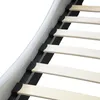 Close-up view of a bed frame's wooden slats and black support structure. Produktbild-Vorschau