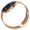 A close-up, side view of a rose gold smartwatch with a mesh band, displayed against a white background. Podgląd zdjęcia produktu