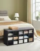 A bedroom scene with a storage bench at the foot of the bed. Náhled obrázku produktu