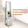 A full-length mirror with shelves, shown in a room setting with a bed in the background. Voir les images du produit