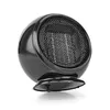 A black ceramic fan heater with a hexagonal grill is shown on a white background. Anteprima dell’immagine prodotto