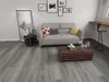 A living room scene with a sofa, coffee table, and side table. Produktbild-Vorschau