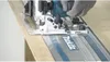 A close-up of a person using a Makita circular saw on a wooden surface. Anteprima dell’immagine prodotto