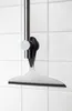A squeegee is attached to a metal pole against a tiled wall. Produktbild-Vorschau