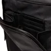 A close-up view of the interior of a black leather bag, showing various pockets and card slots. Produktbild-Vorschau