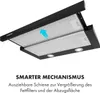 A close-up view of a black range hood, showing its internal mechanism and lighting. Produktbild-Vorschau