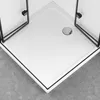 A close-up view of a white shower tray with a chrome drain. Produktbild-Vorschau
