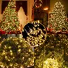 A collage of Christmas decorations, featuring Christmas trees adorned with lights, a wreath, stockings, and a close-up of LED lights. Produktbild-Vorschau