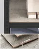 Close-up of a shelf with boxes and a detail of the material thickness. Produktbild-Vorschau