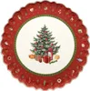 A round plate with a Christmas tree and presents design. Produktbild-Vorschau