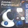The image shows the packaging of a KOSMOS Zimmer-Planetarium, a 2-in-1 projector. It features promotional text and images of celestial bodies. Náhled obrázku produktu