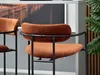 Close-up of a copper and black bar stool. Náhľad obrázku produktu
