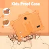 A child's tablet in an orange bear-shaped case is shown falling onto a cracked surface, illustrating its durability. Produktbild-Vorschau
