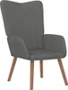 A dark gray velvet armchair with wooden legs, shown from the front. Náhled obrázku produktu