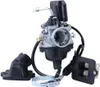 A carburetor assembly with associated parts, including an intake manifold and a reed valve block, is presented against a white background. Produktbild-Vorschau