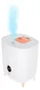 A white humidifier emitting a blue mist. Anteprima dell’immagine prodotto